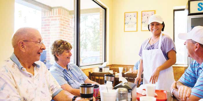 Toubee Phromsavanh and guests at Granny's Old Fashioned Donuts in Aberdeen North Carolina.