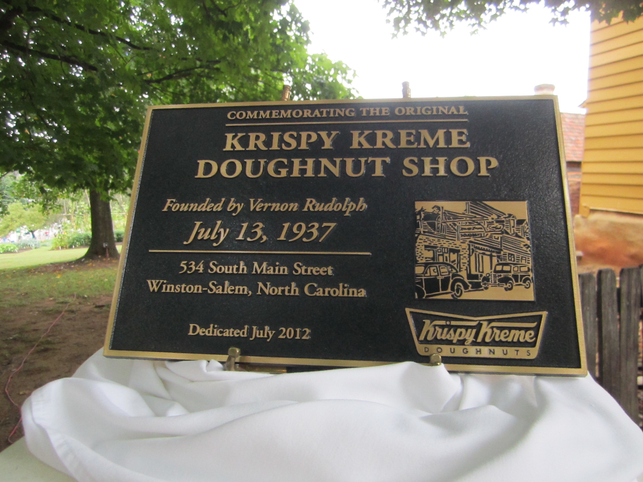 Krispy Kreme Historic plaque at 75th anniversary celebration Photo by Julie Thomson
