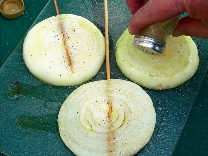 salt and pepper the onions