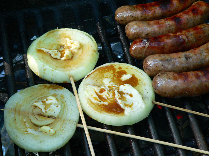 Let the Vidalia steaks cook until they are tender and slightly translucent. Use the skewer to gently lift them and make sure they aren't burning on the bottom. Flip them over about halfway through cooking and let them continue cooking until done.