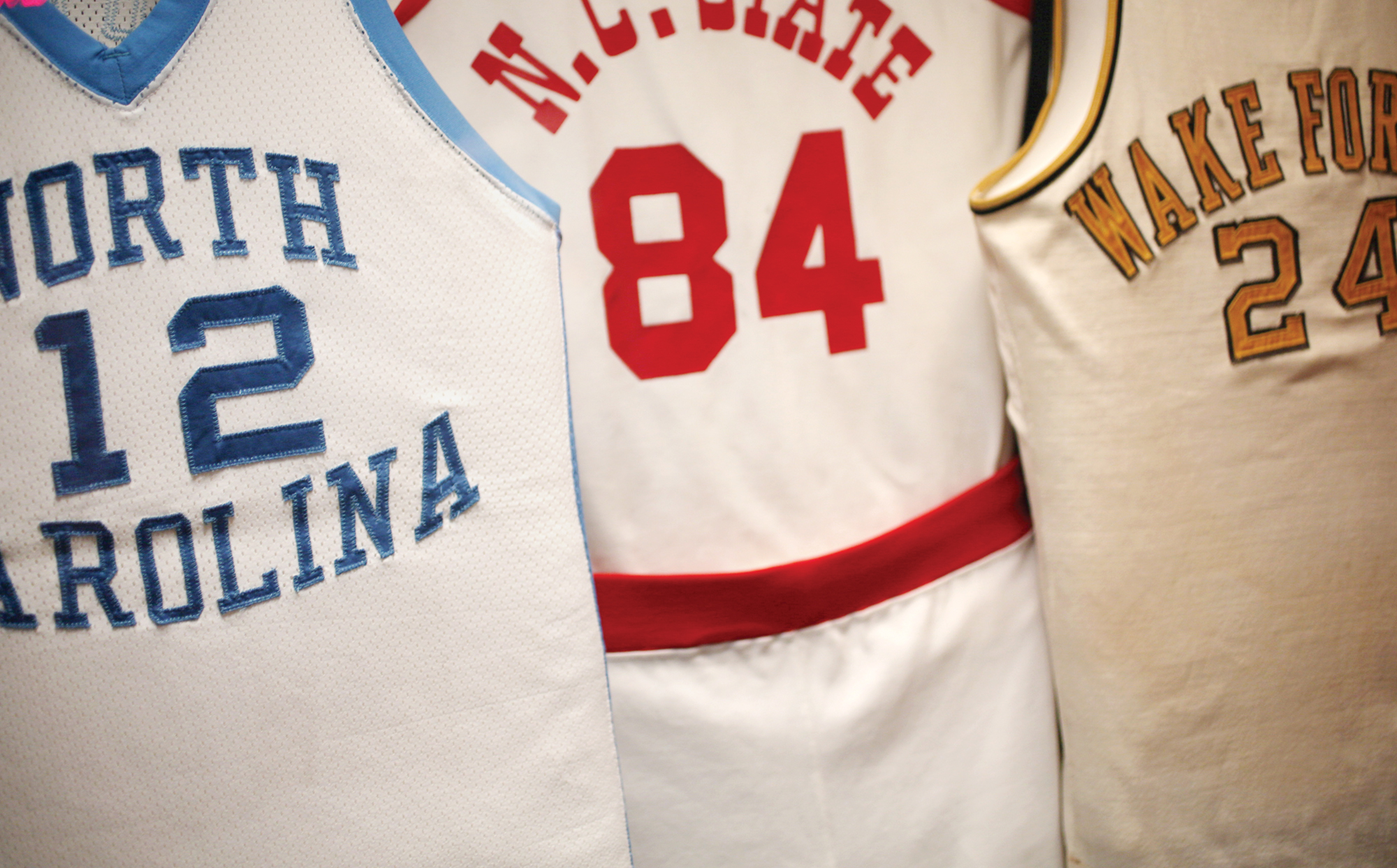 Phil Ford's #12 jersey hangs with those of other ACC greats.