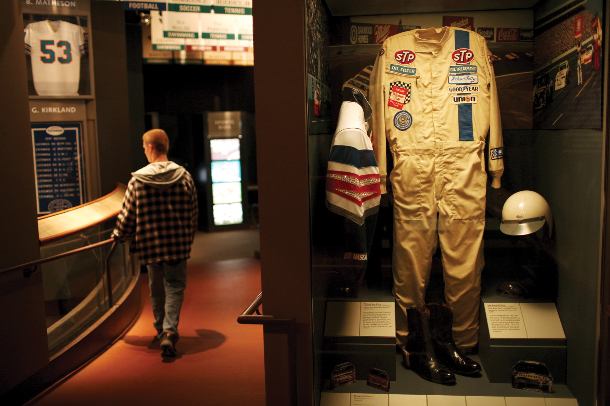 Richard Lee Petty's coveralls from 1971 stand proudly next to his car.