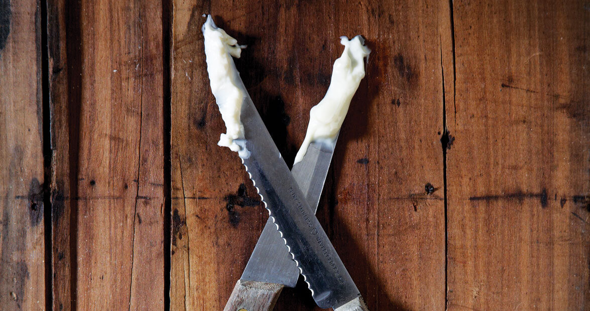 Knives covered in mayonnaise