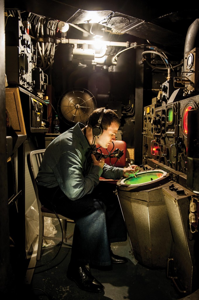 In 1944, Marines, sailors, and Santa (left) celebrated Christmas in the Philippines. Today, a reenactor shows what life was like at the controls of the USS North Carolina.