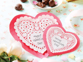 Valentine's Day heart shaped cards with candy and sweets.