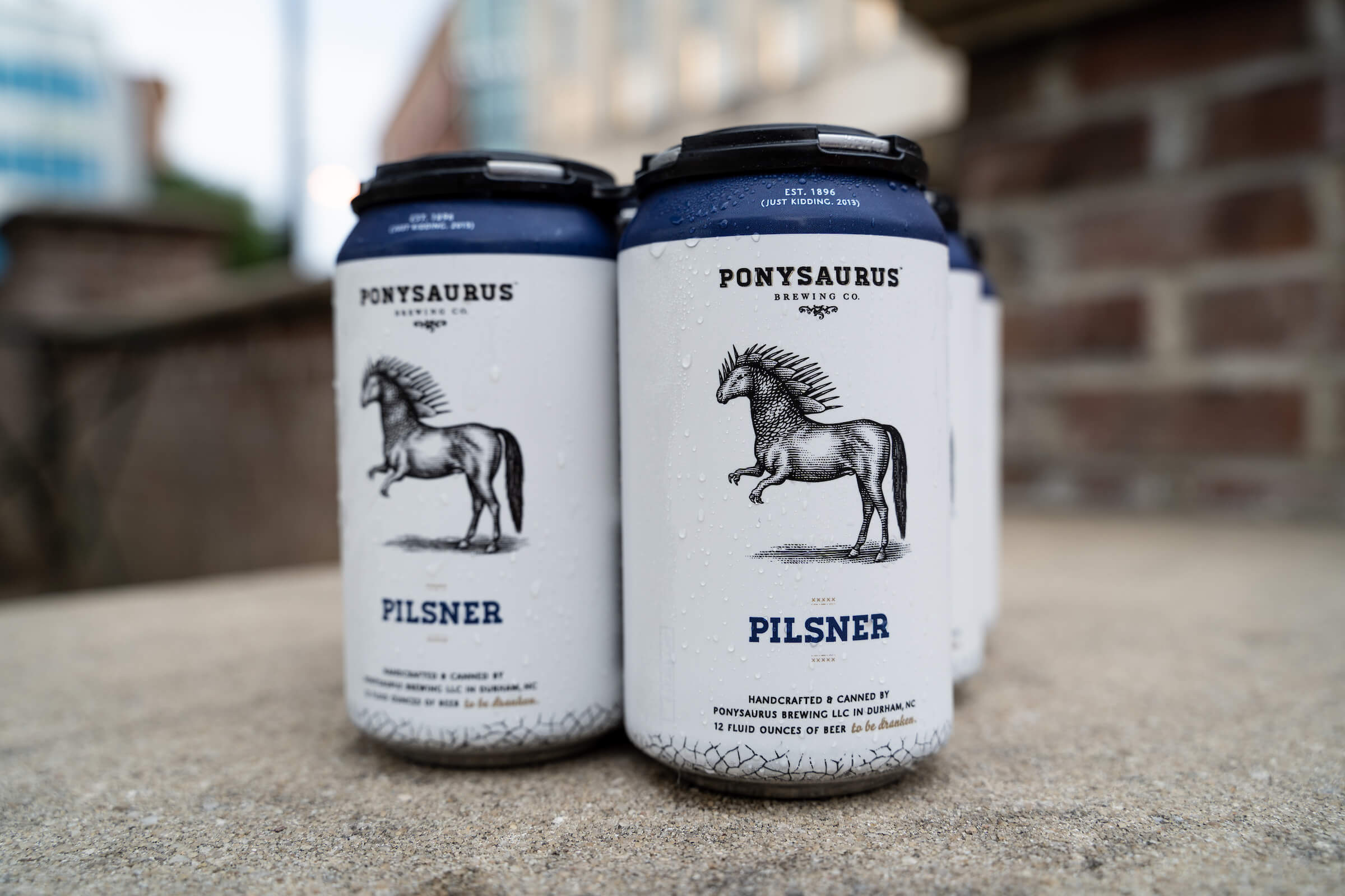 Six-pack of Ponysaurus Pilsner.