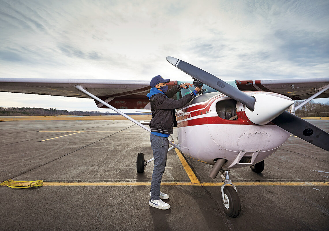 Ellis Woodyard checks the plane.
