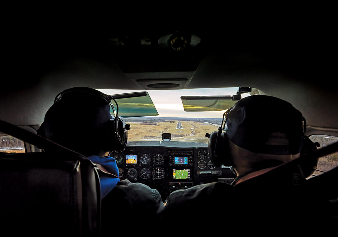 Warren Wheeler teaching Ellis Woodyard.