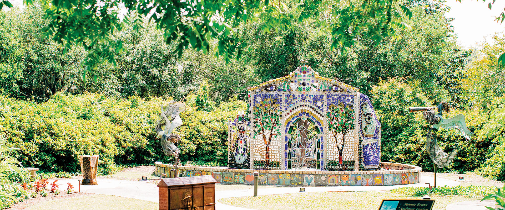 Broad photo of Arlie Gardens with sculptures.