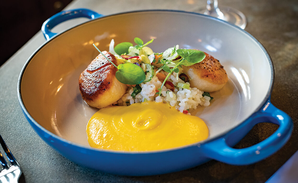 A dish with scallops.