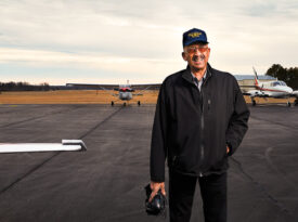 Warren Wheeler stands on the tarmac.