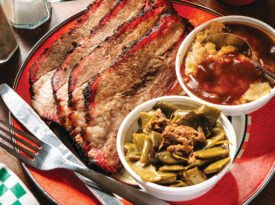 Sliced brisket and sides at The Honey Hog.