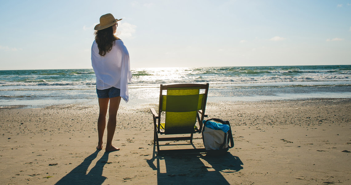 Woman on the beach in Corolla, NC