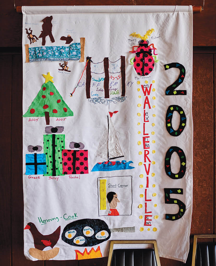 Banners made by visiting families hang on the walls at the Bannerman Folk Camp.