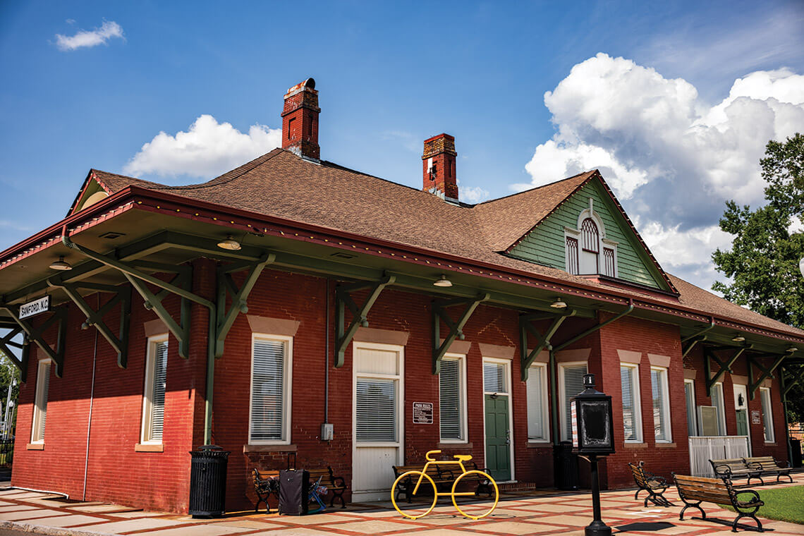 The old red-and-green brick depot in Sanford, North Carolina