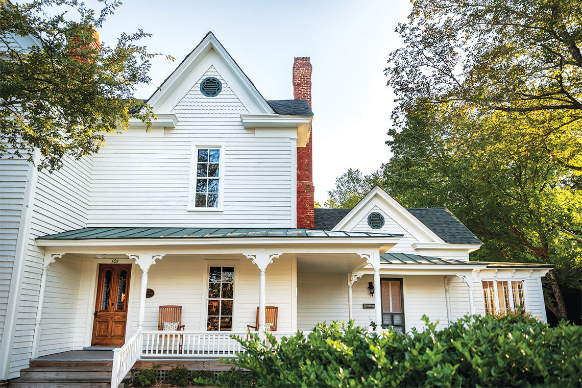 The Banks Bed and Breakfast in Garner North Carolina is a historic, white farm house-style building