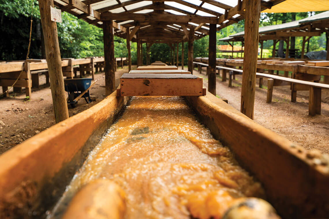 Brown water flows through the flumes at Mason's Mine