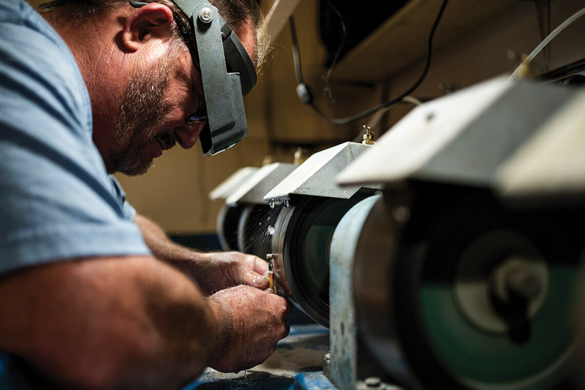 Kevin Klatt spends much of his time at the back of Ruby City, cutting the sapphires and other stones that come from Mason’s Mine.