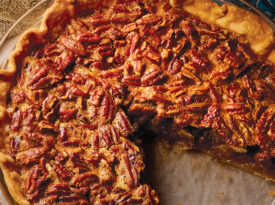 Pecan pie with a slice removed