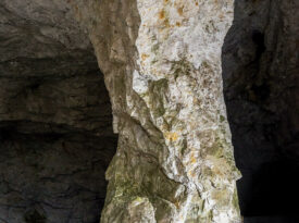 Alex Glover stands at Gem Mountain Hoot Owl Mine