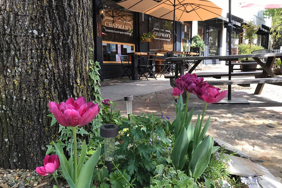 Outdoor tables at Chapman's Food & Spirits in Southern Pines.