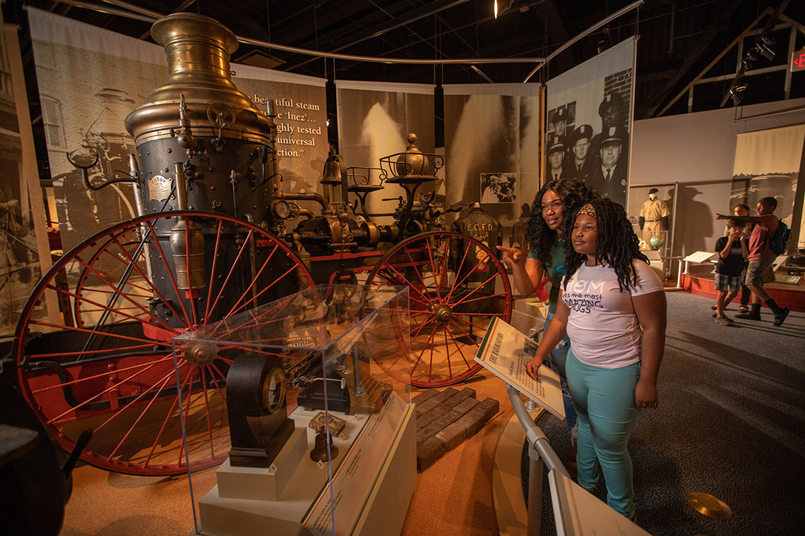 Museum goers check out artifacts at the Museum of the Albemarle in Elizabeth City