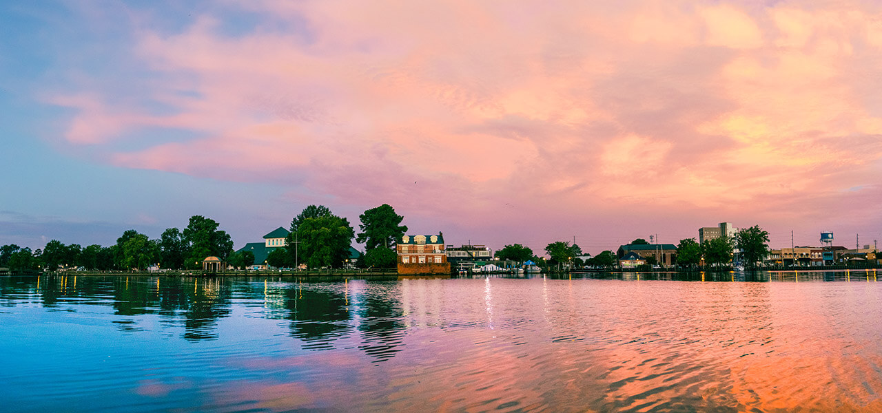 View of Elizabeth City across the water at dusk.