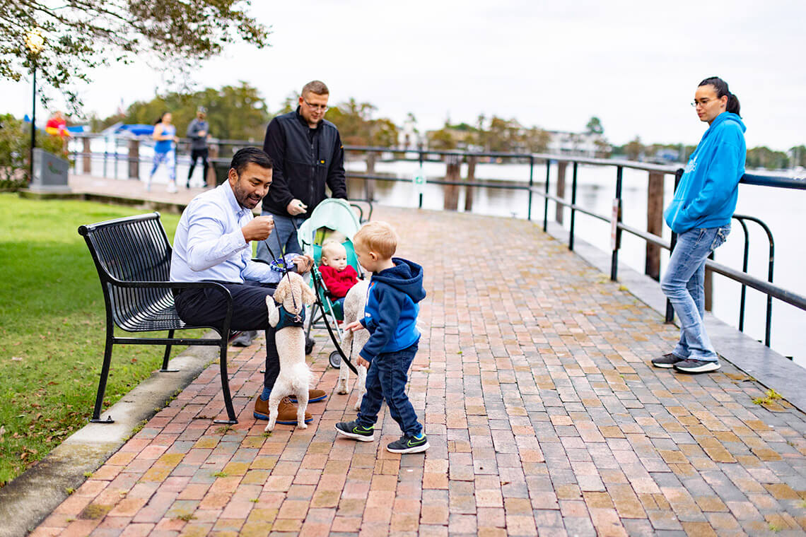 Family sits at the Waterfront Harbor in Elizabeth City