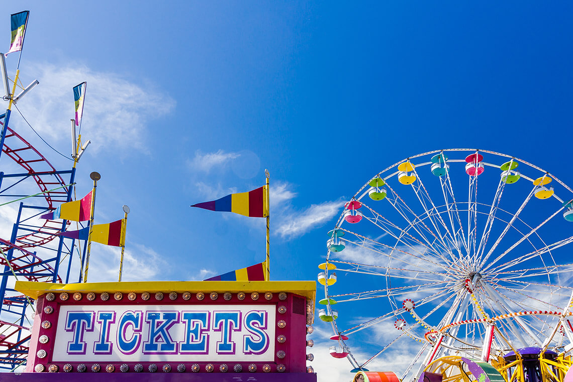 Ticket stand and Ferris wheel at the Carolina Classic Fair in Winston-Salem.