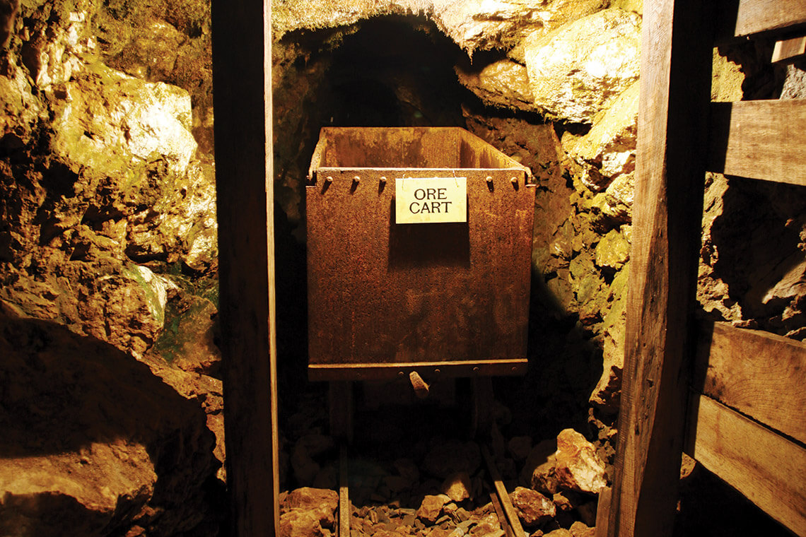 Underground shaft with ore cart inside Reed Gold Mine