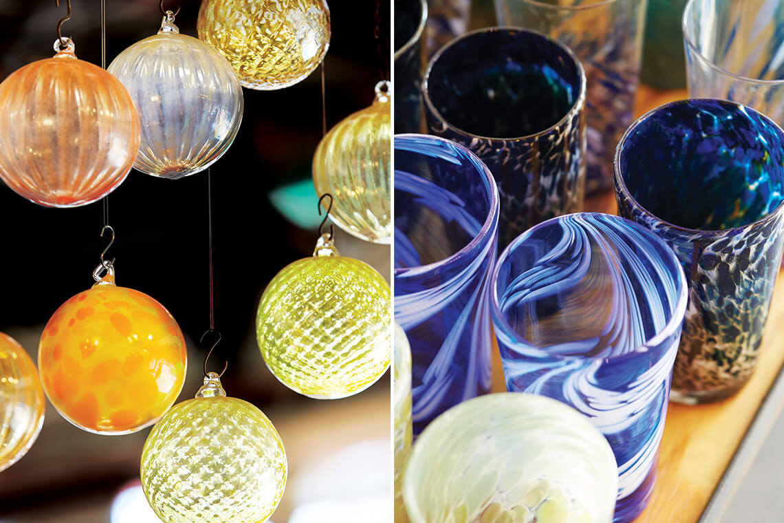 Hand-blown orbs and glasses made by glass artists at the North Carolina Glass Center.