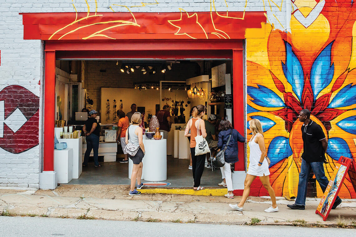 People shop at the North Carolina Glass Arts Center