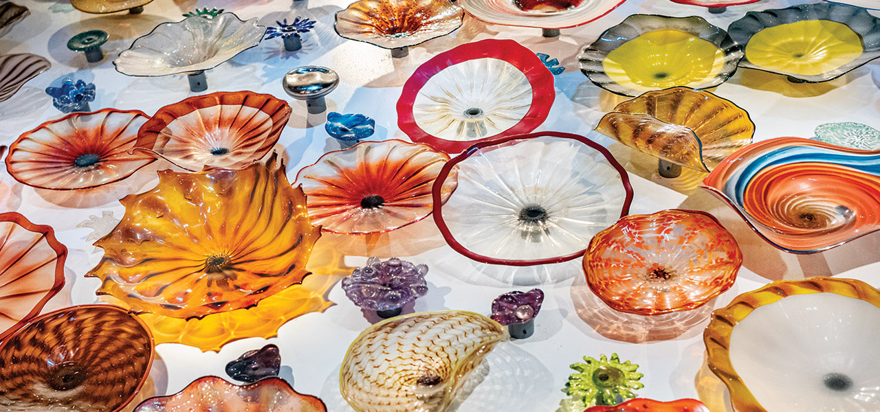 The hand-blown glass plates lining the wall at Vidrio are just one display of North Carolina's talented glass artists