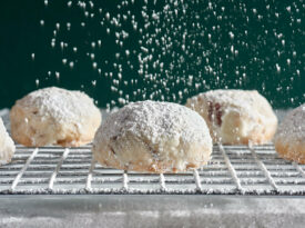 Pecan puffs on a cooling rack.