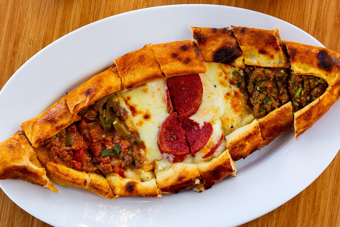Pide filled with meat and cheeses from Istanbul Restaurant in Cary, North Carolina.