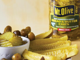 Plate of mt olive pickles and a jar.