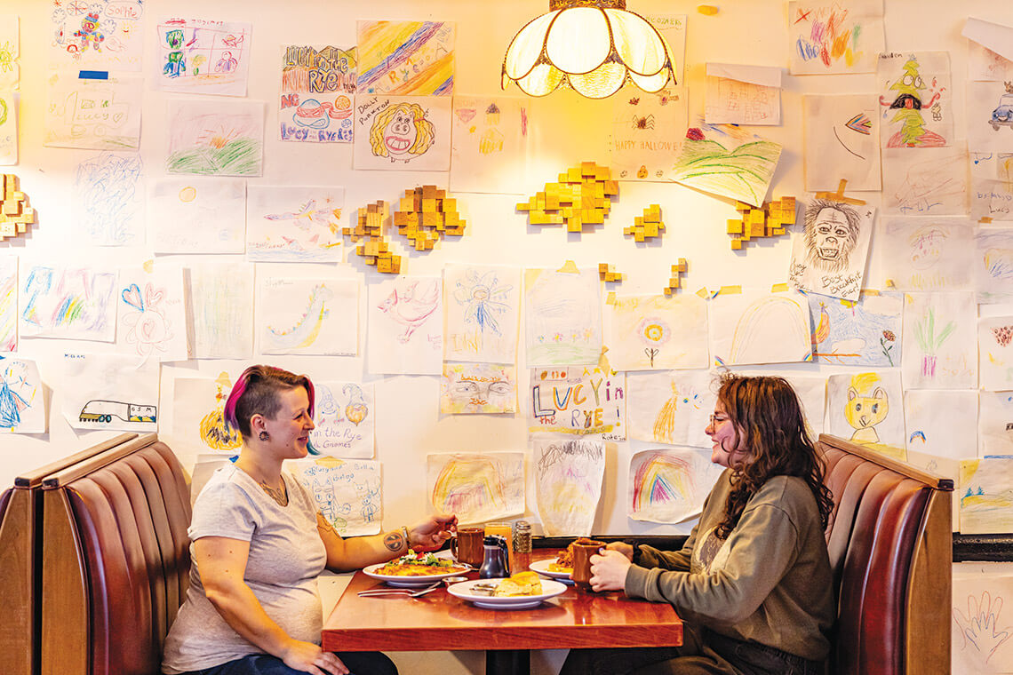 Diners at a booth at Lucy in the Rye diner in Sylva.