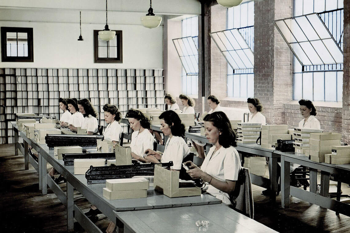Pharmacists pack containers of North Carolina remedies to ship.