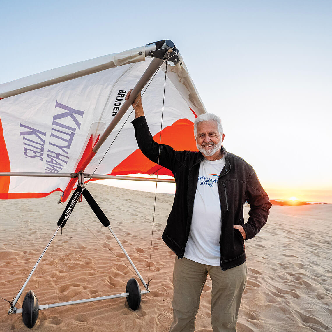 John Harris stands with a glider