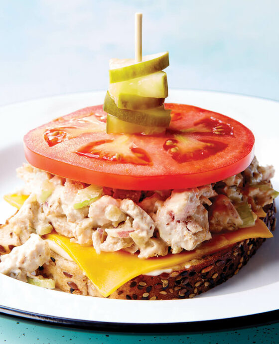 Open-face tuna melt with tomato and pickles