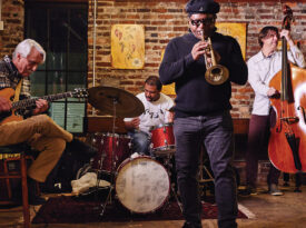 arcus Printup jams with members of UNCG’s music faculty, including guitarist Greg Hyslop, drummer Brevan Hampden, and bassist Steve Haines.