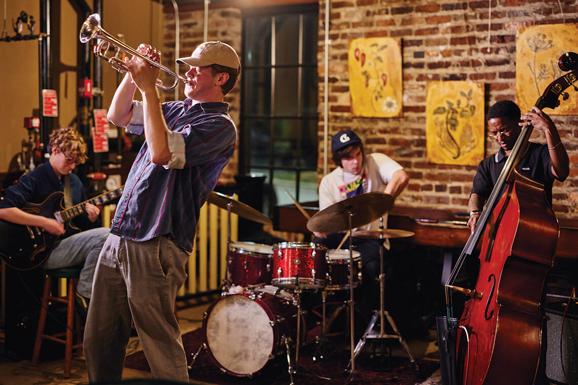 UNCG students Cecilia Richardson, Ian Rood, Jack Jones, and Tyson Baker perform