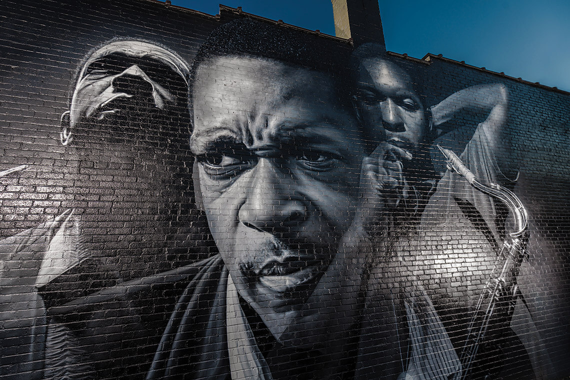 Three faces of John Coltrane depicted in mural in downtown High Point