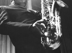 John Coltrane playing saxophone.