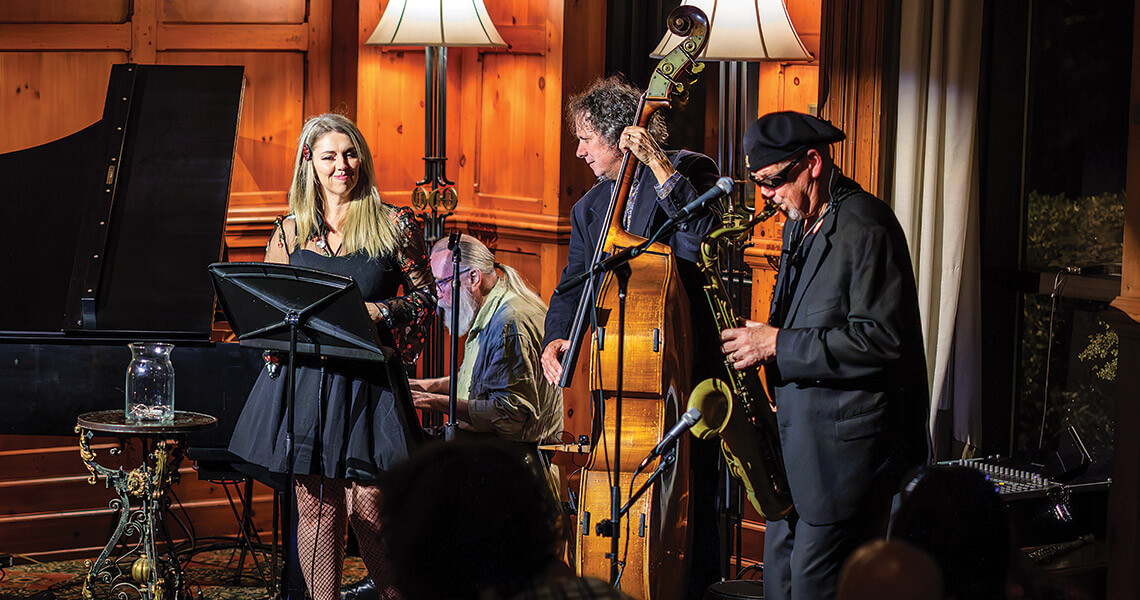 Guest singer Jacqui Otaño performs with the house band at the O.Henry Jazz Night