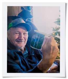 Avery Sisk poses with a mug
