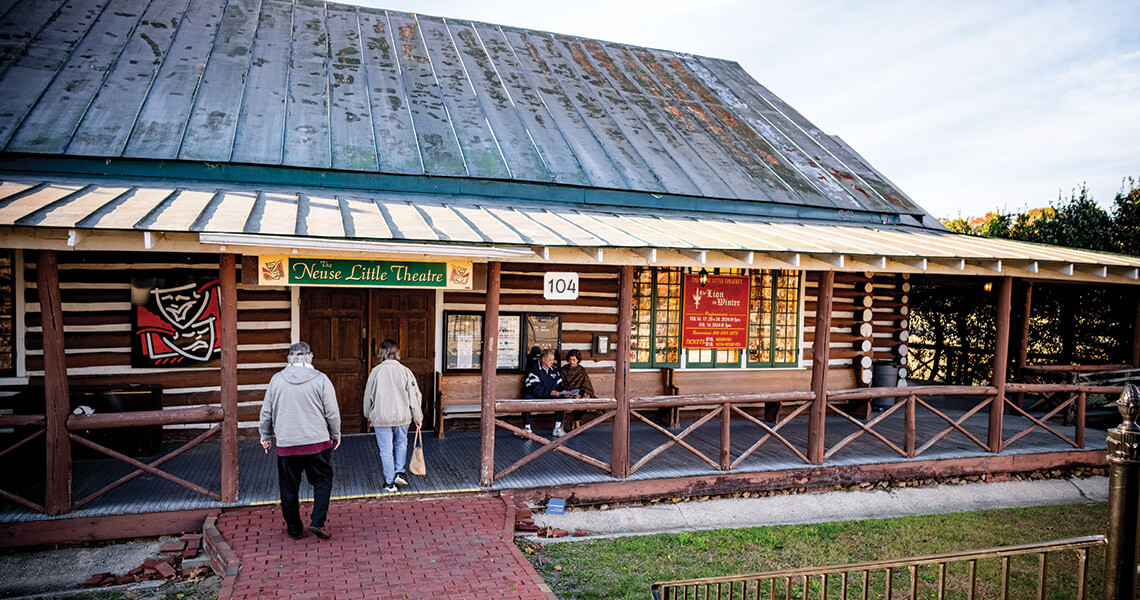 People enter the Neuse Little Theatre
