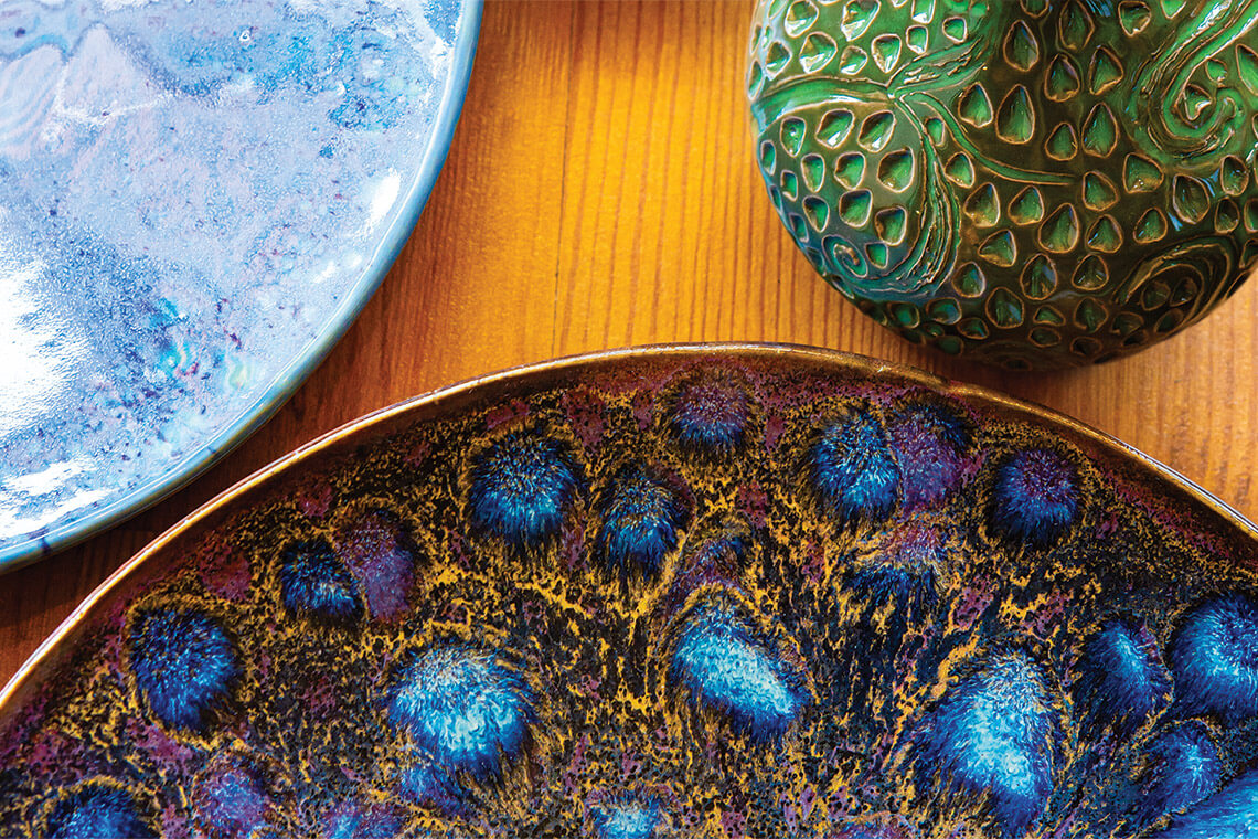 Ceramic plates and a bowl made by members of the Valley River Arts Guild, found at the gallery at the Murphy Art Center