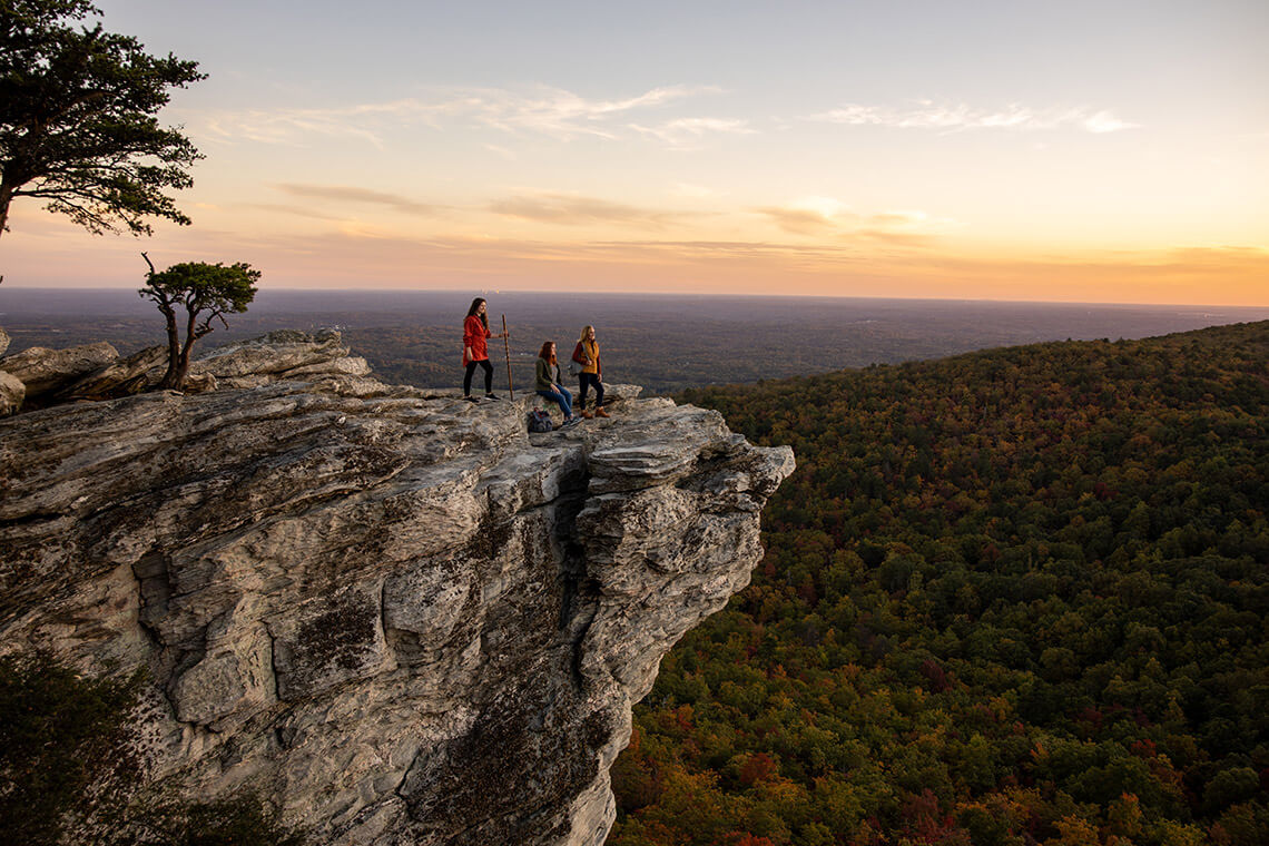 Hikers admire the view from Hanging Rock State Park.