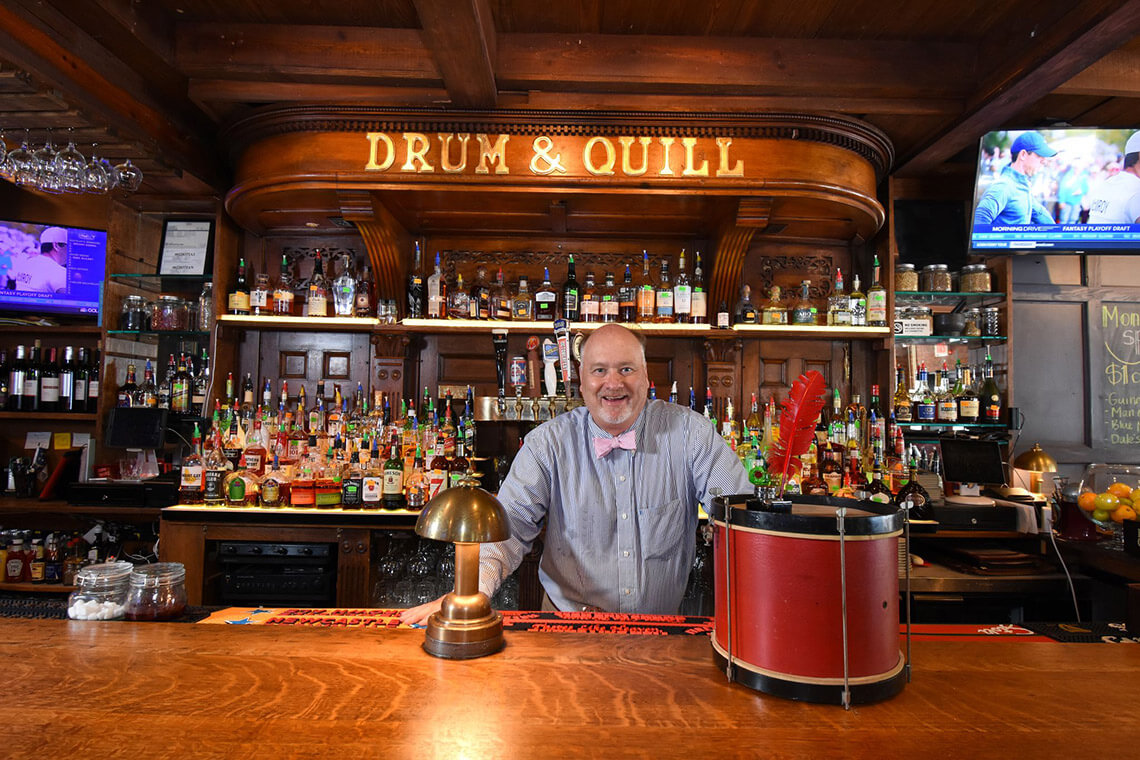 Kevin Drum behind the bar at Drum & Quill in Pinehurst, NC